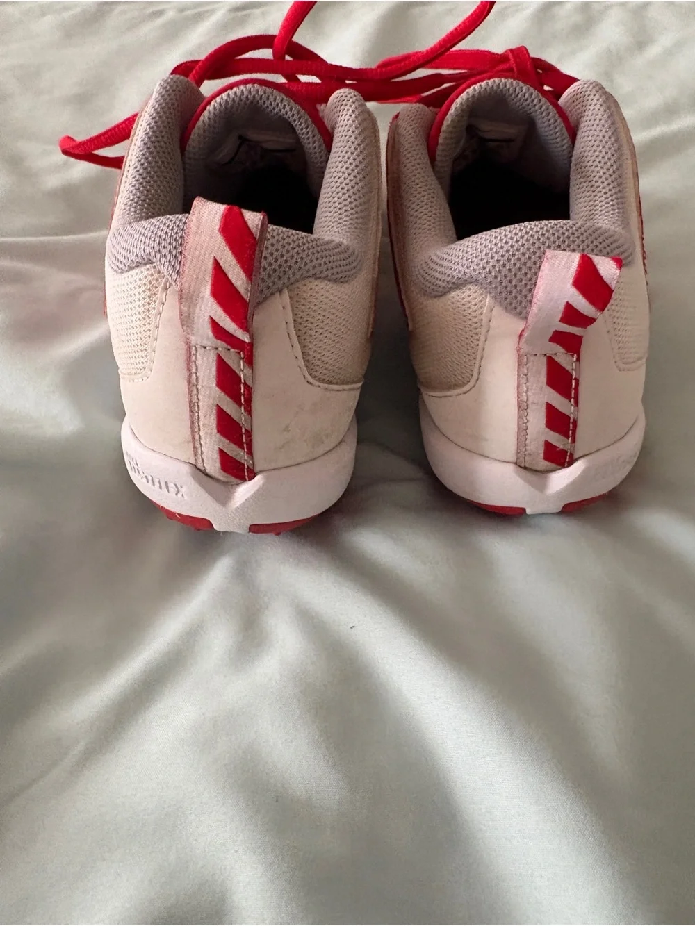 Nike Red and White Youth 4.5 Cleats with Yellow Sole Accents